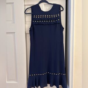 Michael Kors dress with gold studs and ruffle.